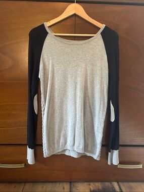 Scoop neck sweater with elbow patches and scalloped back